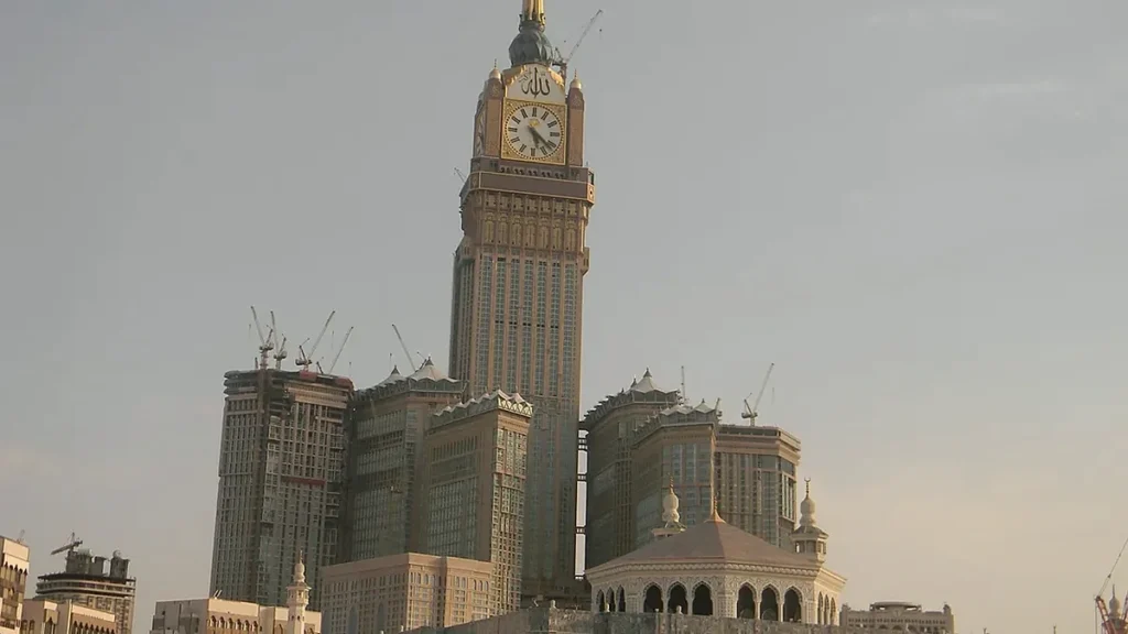 Makkah clock tower and city buildings for a hotel pickup handover guide